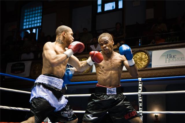 Jones (L) landing the left hook. 