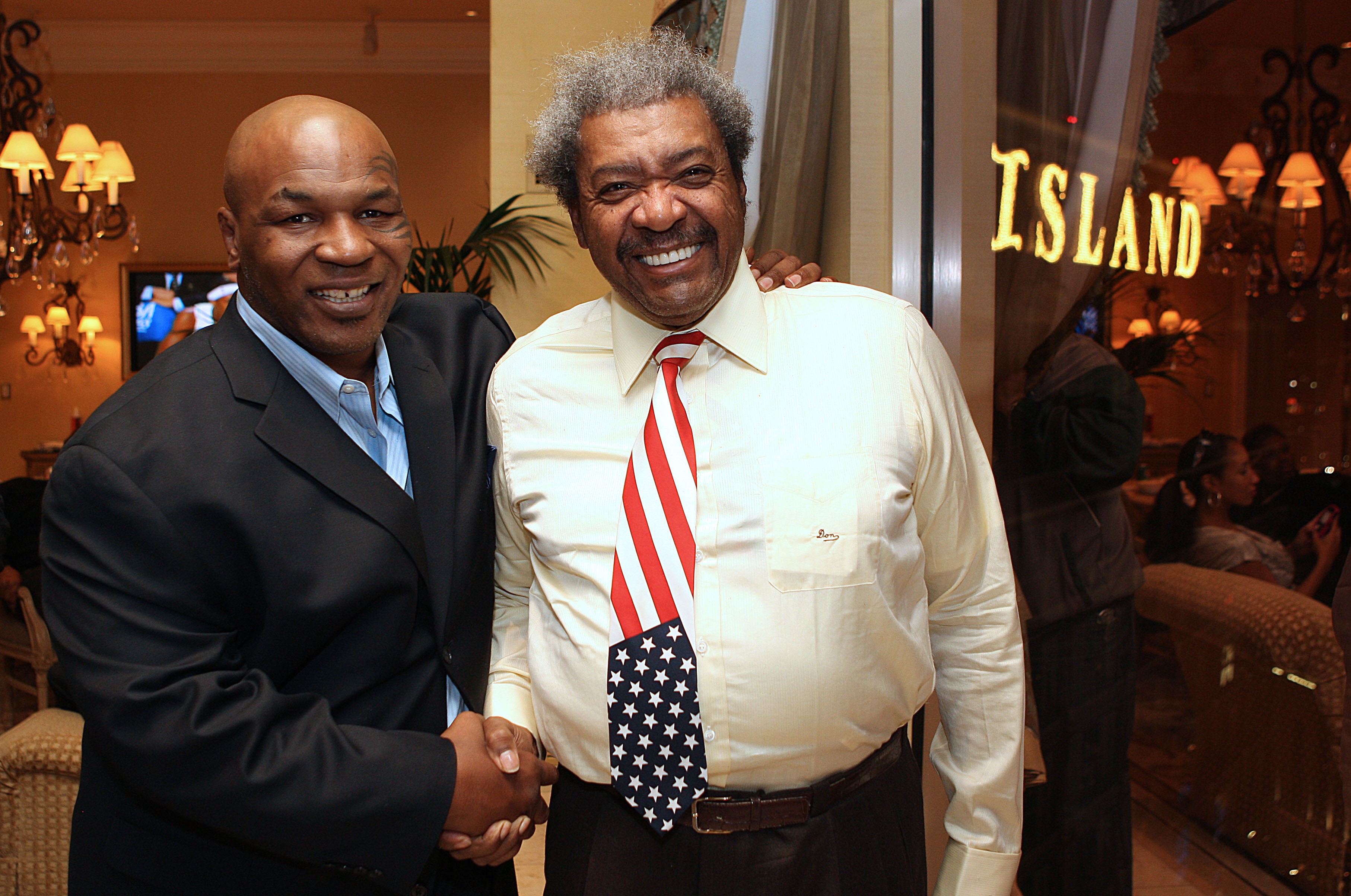 Former champ Mike Tyson and promoter Don King